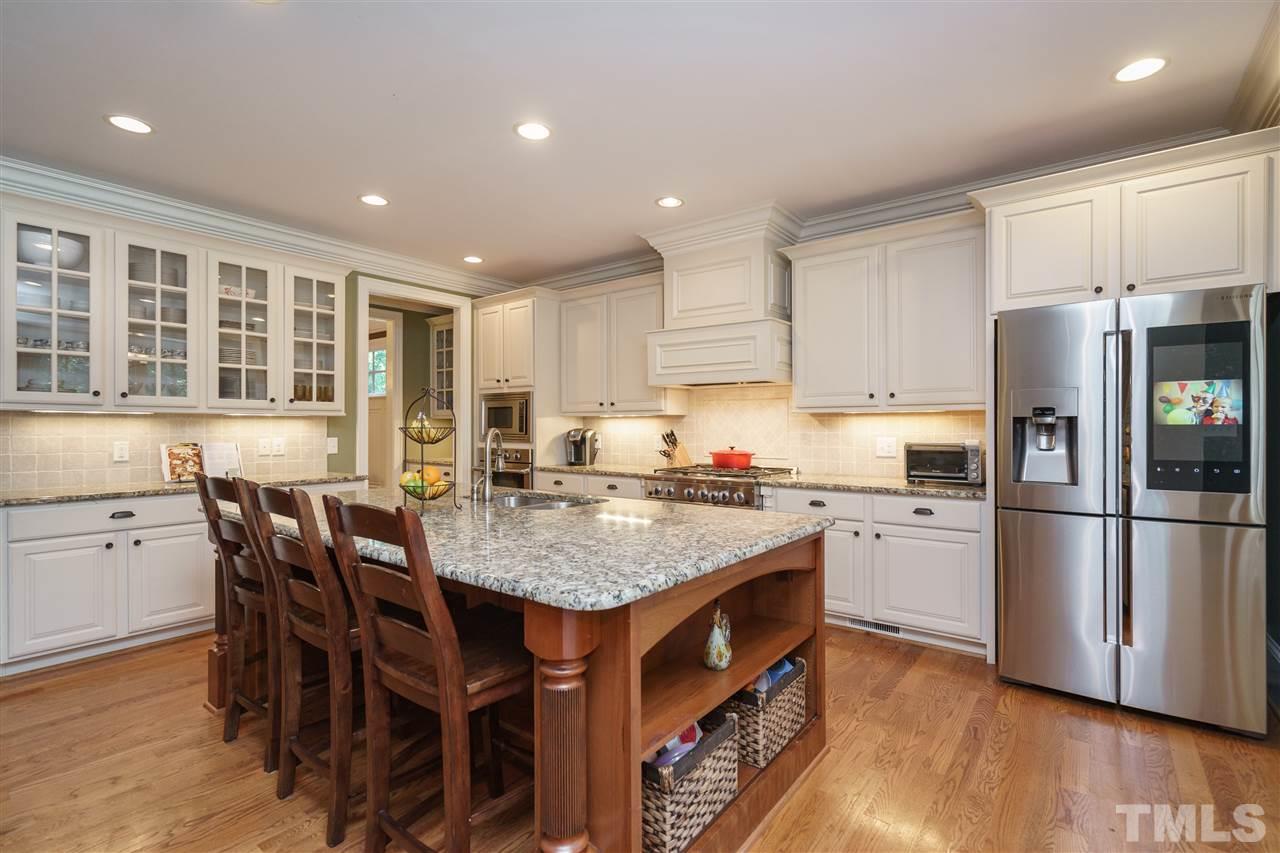 3029 Farrior Road Raleigh, NC 27607 - Photo 12 of 25 ...has large island, lots of cabinets, a butler's pantry.