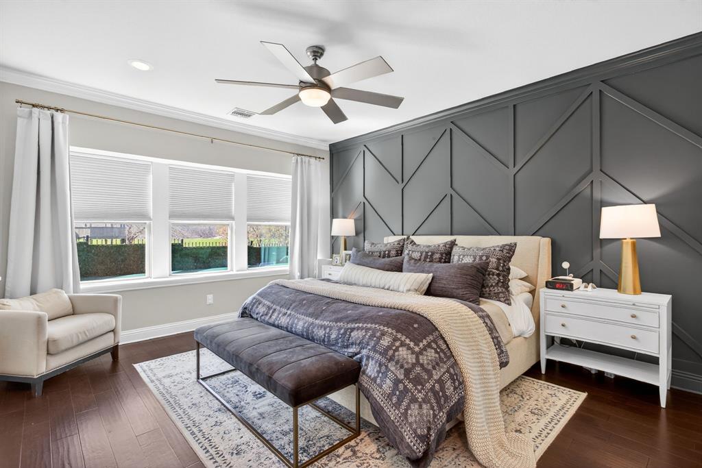 5213 Scott Road Fort Worth, TX 76114 - Photo 15 of 35 a bedroom with a bed and a chandelier