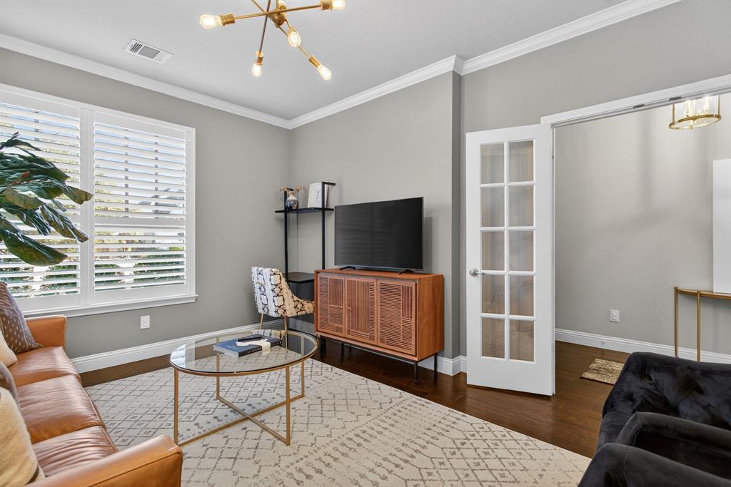 5213 Scott Road Fort Worth, TX 76114 - Photo 23 of 35 a living room with furniture and a flat screen tv