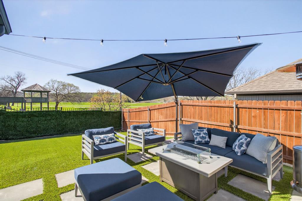 5213 Scott Road Fort Worth, TX 76114 - Photo 27 of 35 a outdoor living space with furniture and garden view
