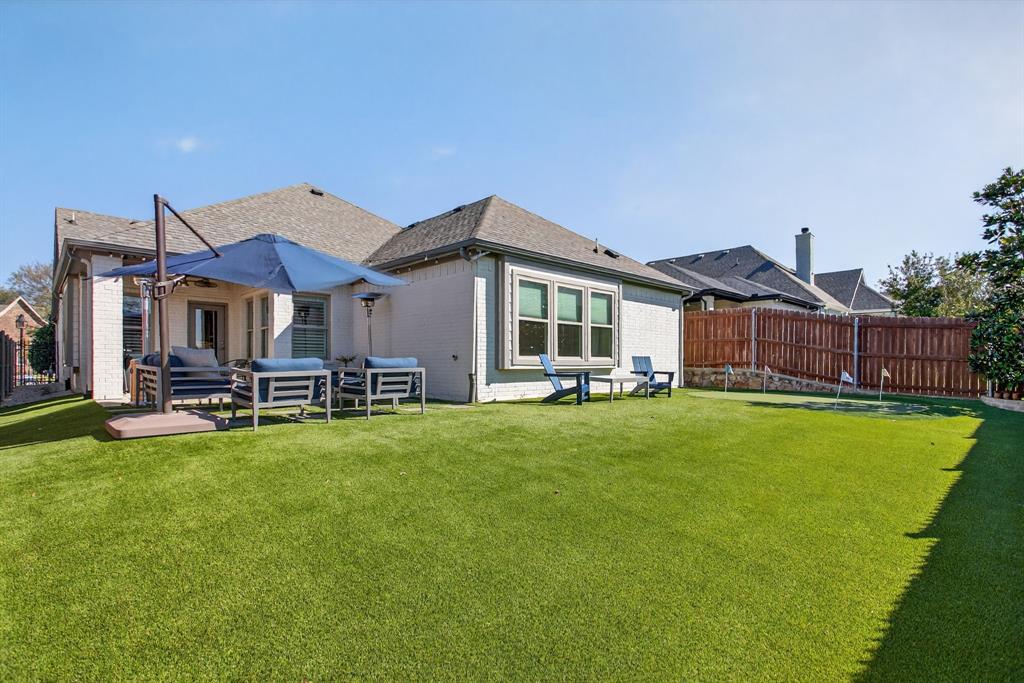 5213 Scott Road Fort Worth, TX 76114 - Photo 28 of 35 a backyard of a house with table and chairs