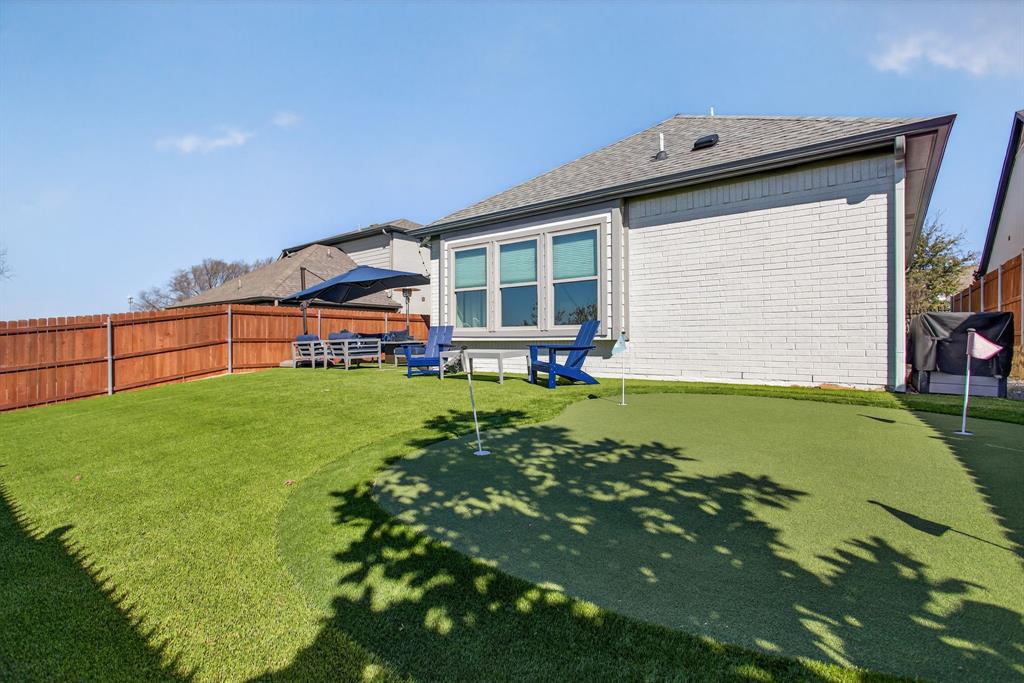 5213 Scott Road Fort Worth, TX 76114 - Photo 29 of 35 a view of an house with backyard space and balcony