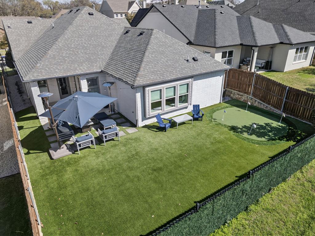 5213 Scott Road Fort Worth, TX 76114 - Photo 31 of 35 a view of a house with backyard and sitting area