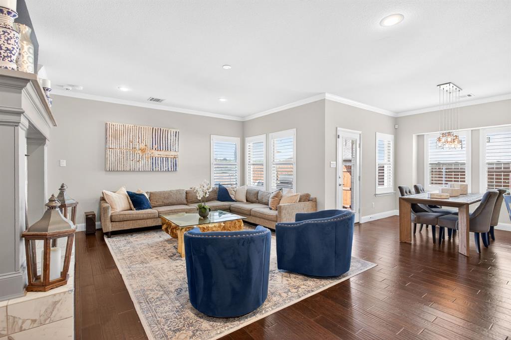 5213 Scott Road Fort Worth, TX 76114 - Photo 6 of 35 a living room with furniture a wooden floor and a window