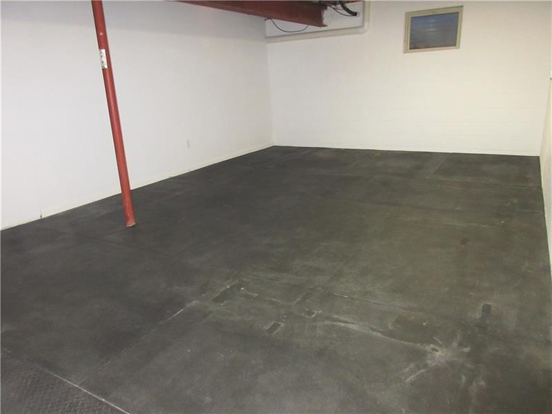 185 Mesa Drive Freeport, PA 16229 - Photo 19 of 25 Huge lower level additional room with matted floor, previously used as a gym.
