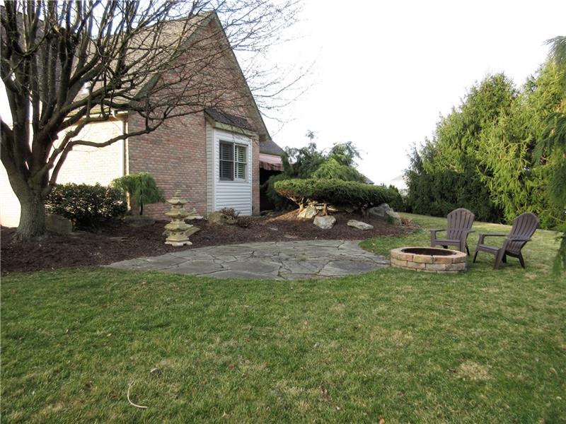 185 Mesa Drive Freeport, PA 16229 - Photo 24 of 25 View of back of home, uncovered patio and fire pit.