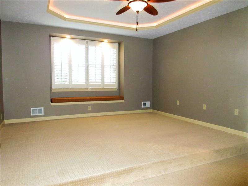 185 Mesa Drive Freeport, PA 16229 - Photo 10 of 25 The 1st floor master bedroom has special features, such as a tray ceiling trimmed with lighting, a lighted ceiling fan, and recessed lighting over bench seating at the window.