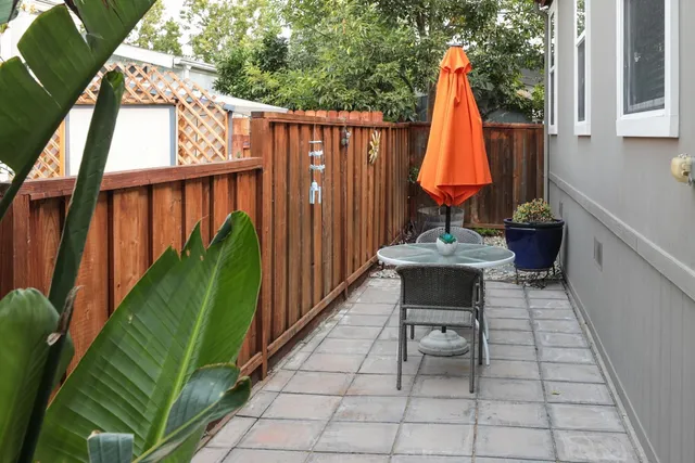 a view of a deck with a back yard