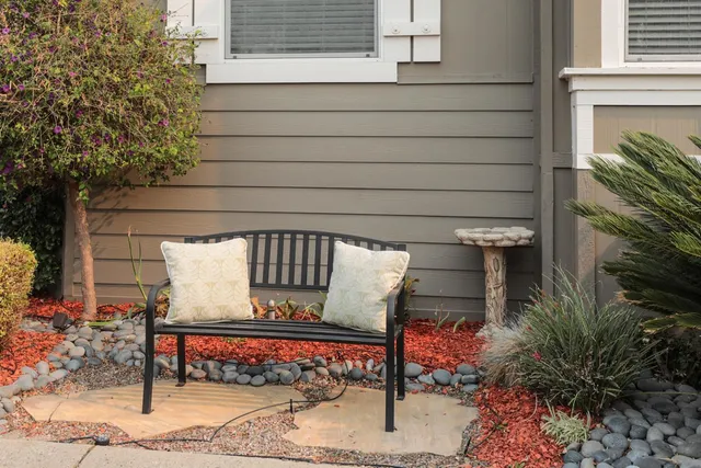 a view of a bench in the patio