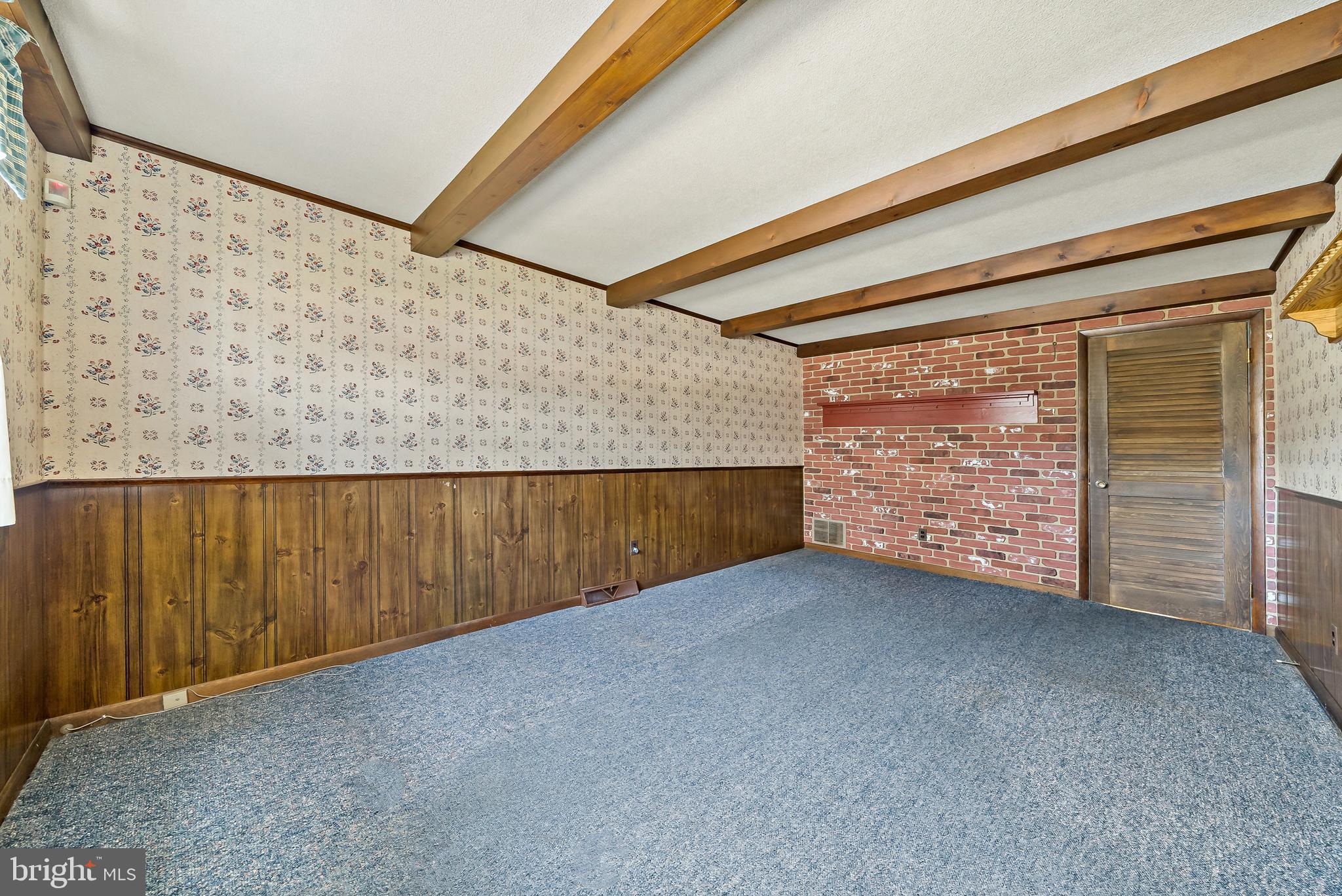 106 Forest Road Cherry Hill, NJ 08034 - Photo 8 of 21 Beamed Ceiling Family Room w/Brick Wall Accents