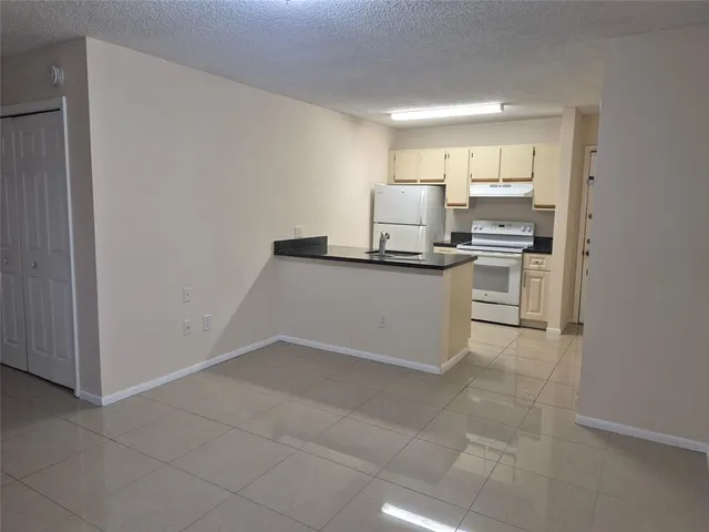 $1,495 | 4481 West McNab Road, Unit 10, Pompano Beach, FL 33069