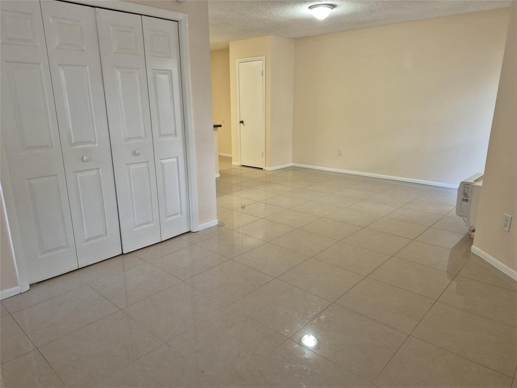 4481 West McNab Road, Unit 10 Pompano Beach, FL 33069 - Photo 8 of 16 a view of an empty room