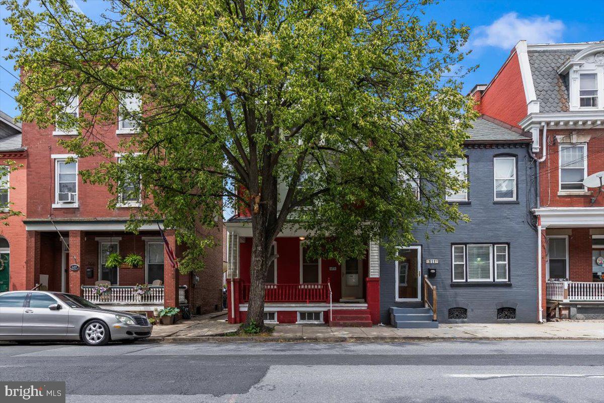 609 East Chestnut Street Lancaster, PA 17602 - Photo 2 of 24 Charming row homes with vibrant facades.
