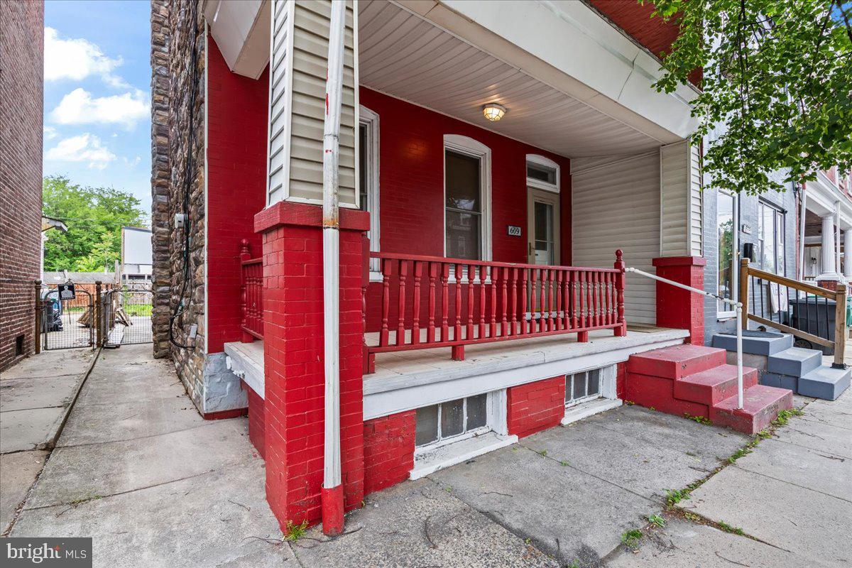 609 East Chestnut Street Lancaster, PA 17602 - Photo 3 of 24 Charming red-fronted porch awaits you.