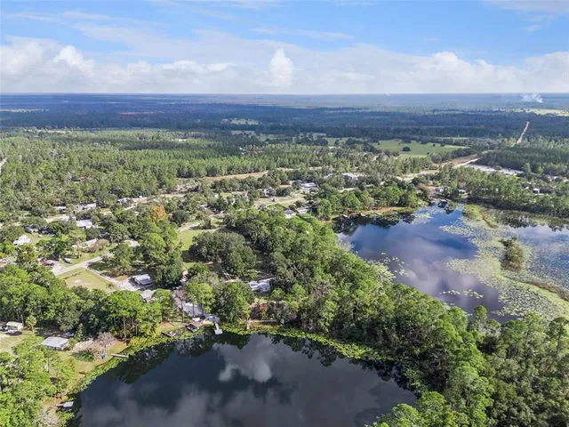 a view of a yard with an ocean