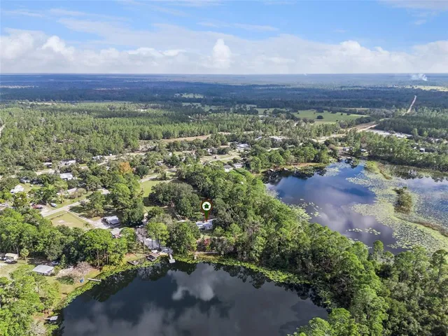 a view of a yard with an ocean