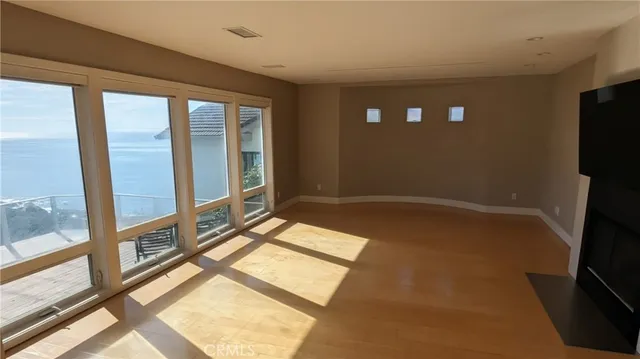 a view of an empty room and window