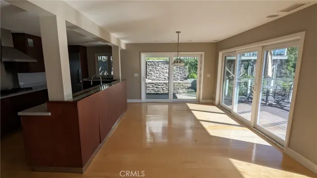 a view of hallway with windows