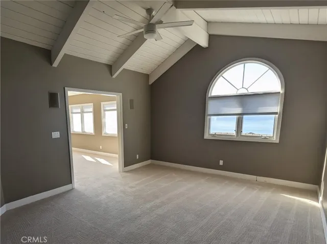 an empty room that has a window