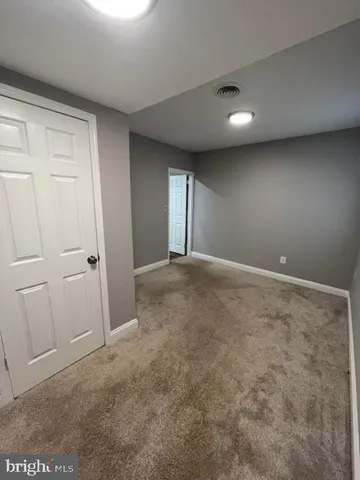 en empty room with windows