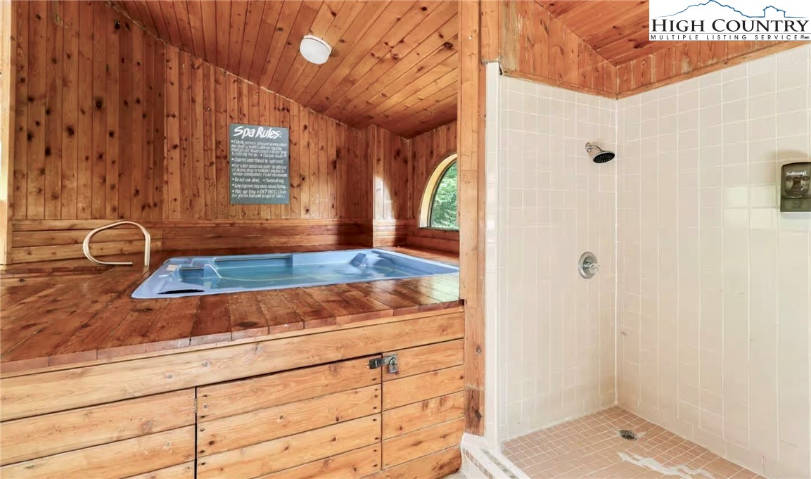 220 Charter Hills Road, Unit C2 Beech Mountain, NC 28604 - Photo 25 of 26 a bathroom with a tub and shower
