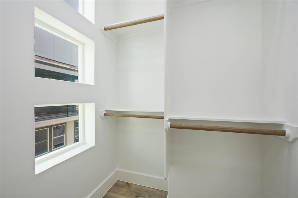 1805 Emir Street, Unit D Houston, TX 77009 - Photo 30 of 36 a room with a walk in closet