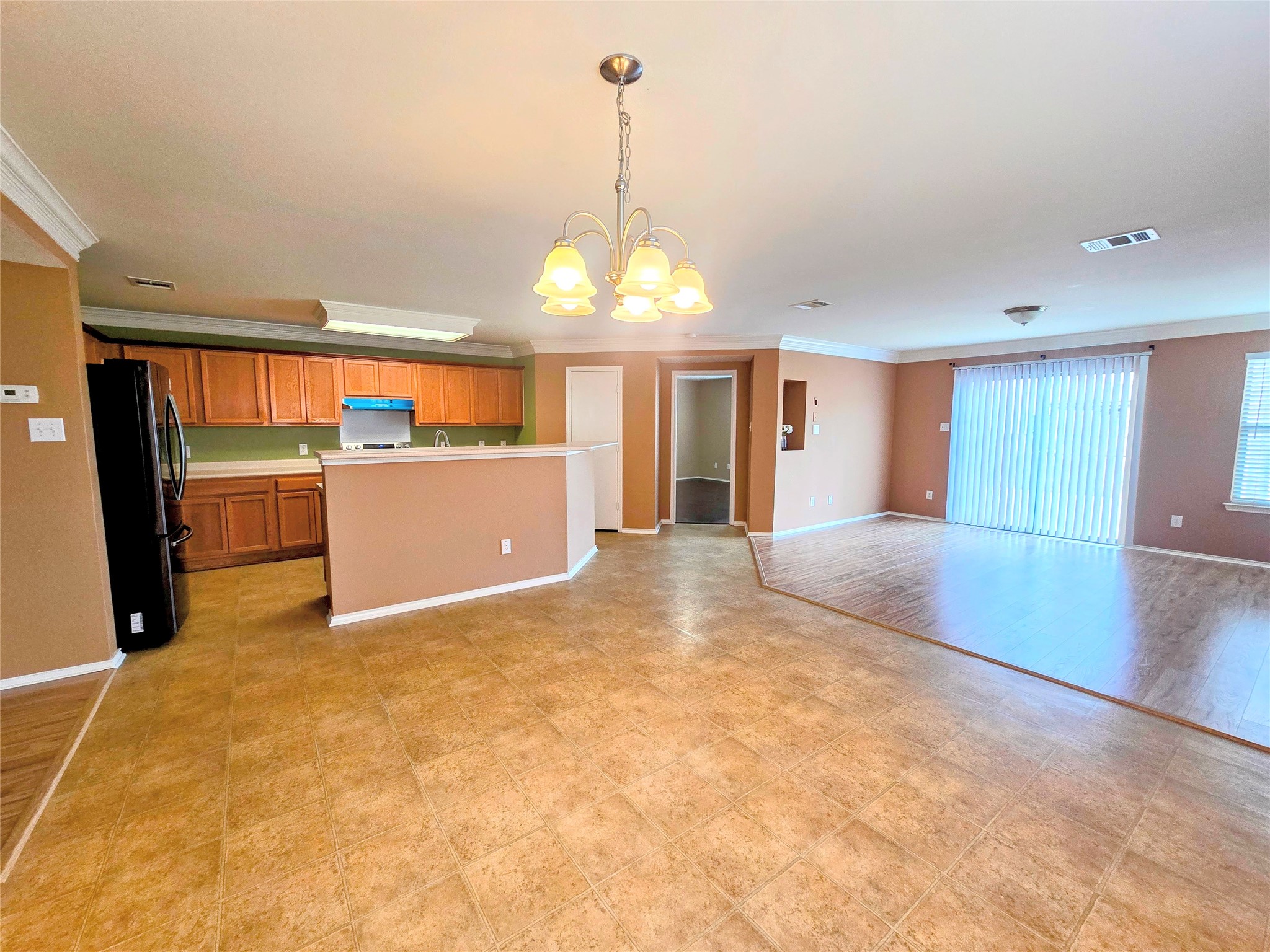 314 Ran Road Leander, TX 78641 - Photo 14 of 14 a view of a room with window and chandelier