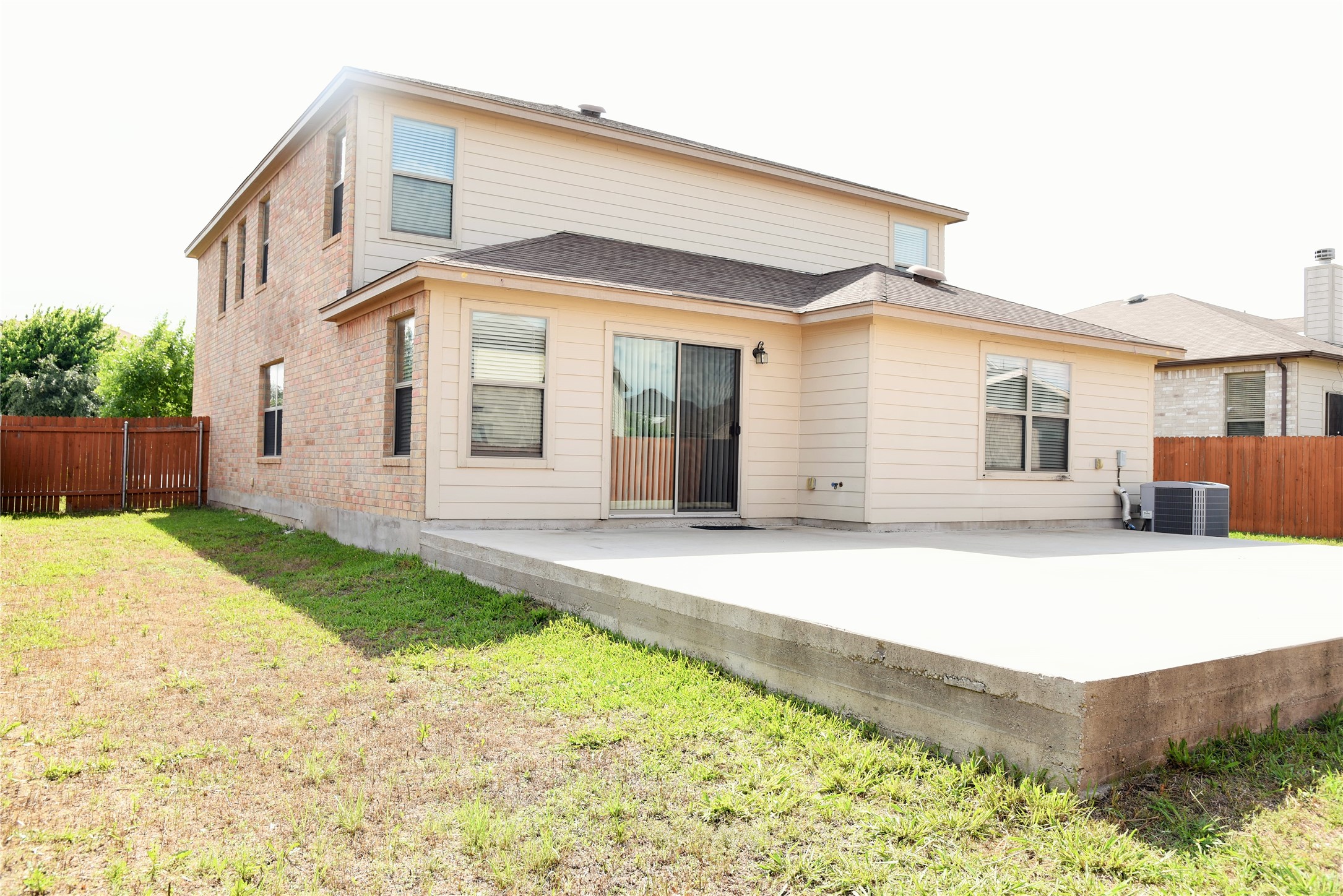 314 Ran Road Leander, TX 78641 - Photo 3 of 14 a front view of a house with a yard and garage