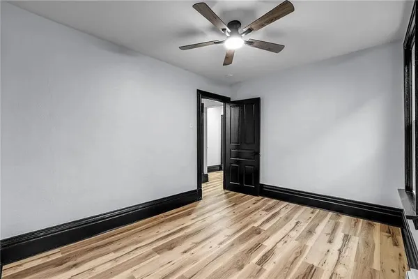 a view of an empty room and window