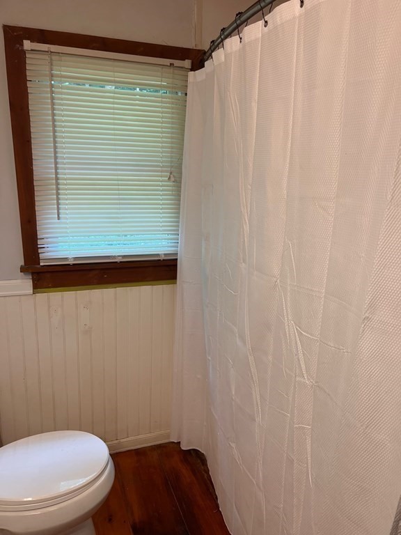 2 Cider Mill Lane Colrain, MA 01340 - Photo 16 of 32 a bathroom with a toilet and a shower curtain