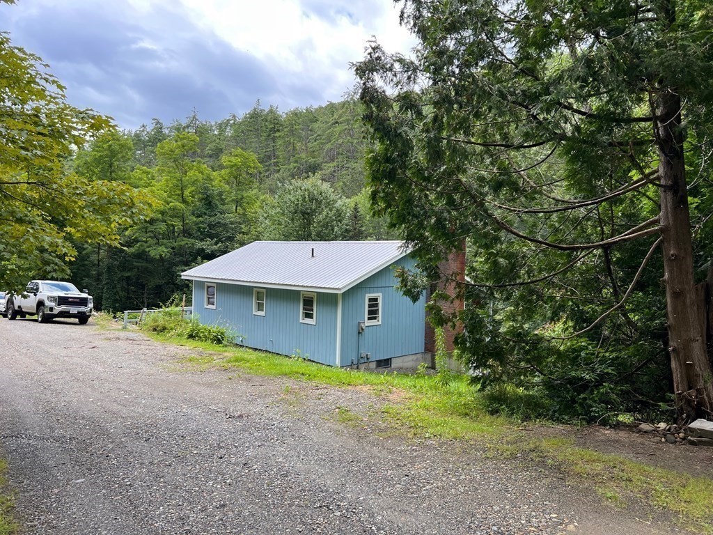 2 Cider Mill Lane Colrain, MA 01340 - Photo 3 of 32 a house view with a backyard space
