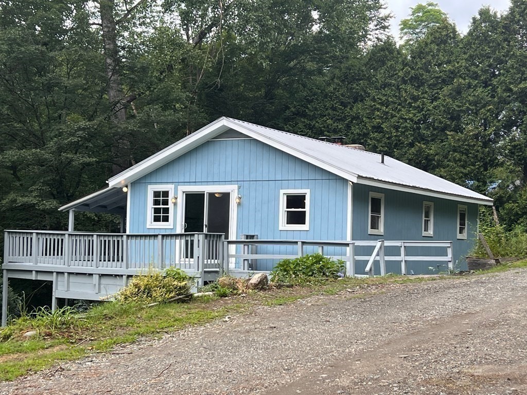 2 Cider Mill Lane Colrain, MA 01340 - Photo 4 of 32 a front view of a house with garden