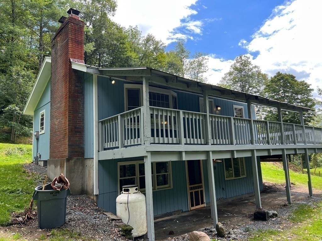 2 Cider Mill Lane Colrain, MA 01340 - Photo 7 of 32 a view of a house with a balcony