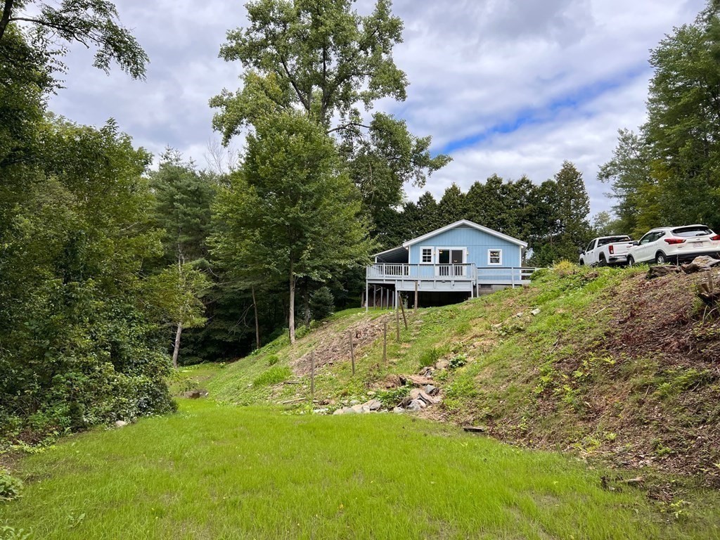 2 Cider Mill Lane Colrain, MA 01340 - Photo 9 of 32 a house view with a garden space
