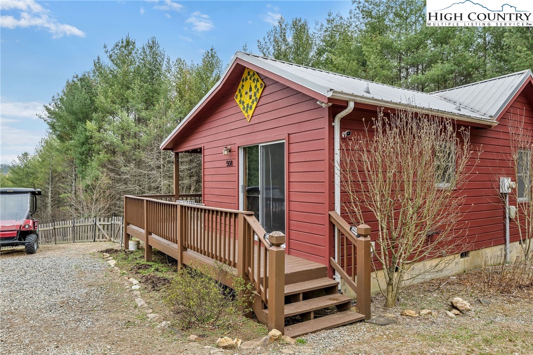 508 Curly Q Drive Crumpler, NC 28617 - Photo 2 of 39 a view of a house with a yard