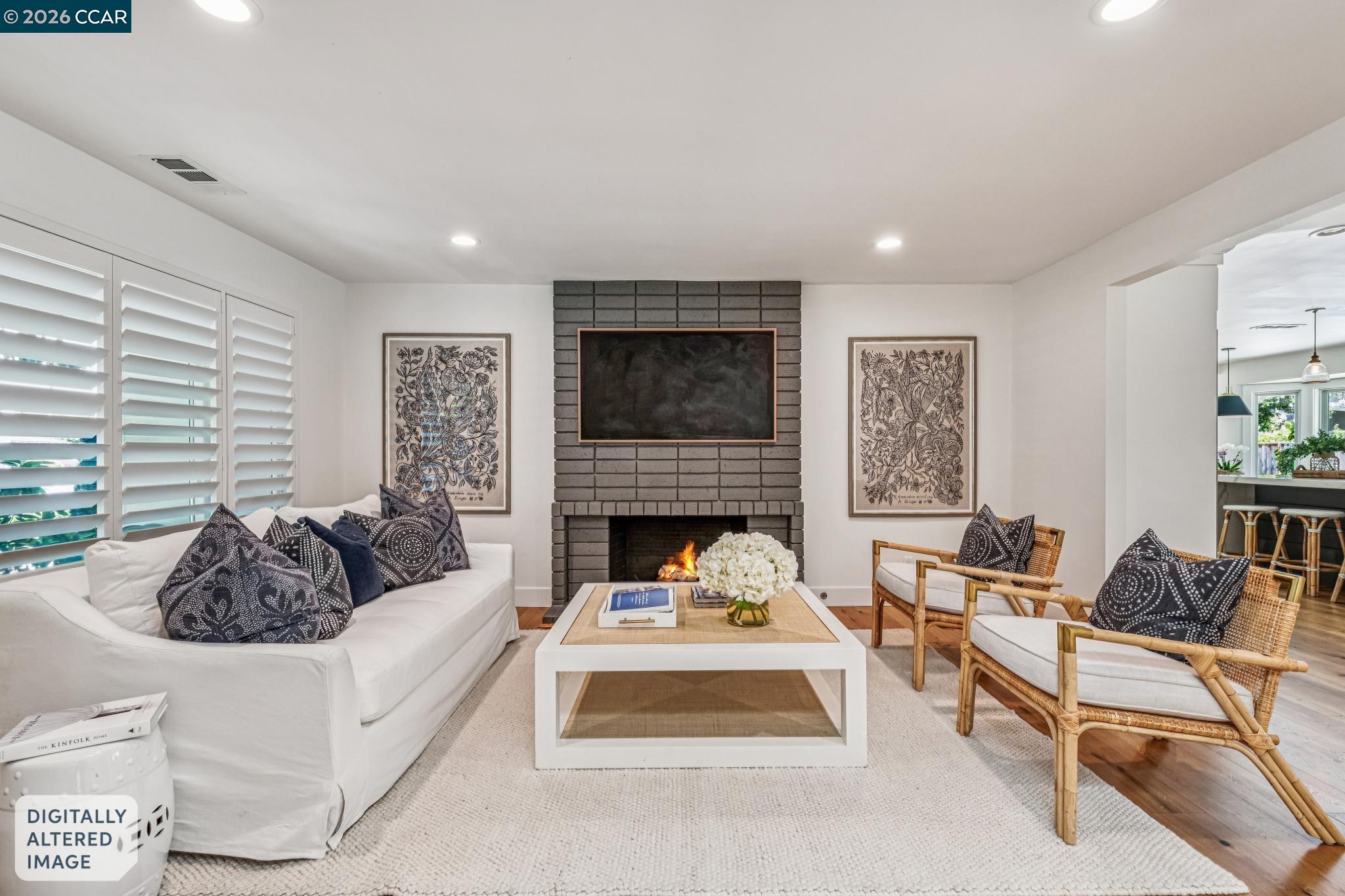 2941 Roundhill Road Alamo, CA 94507 - Photo 11 of 83 a living room with furniture and a fireplace