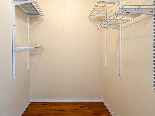a view of small space with racks on the wall