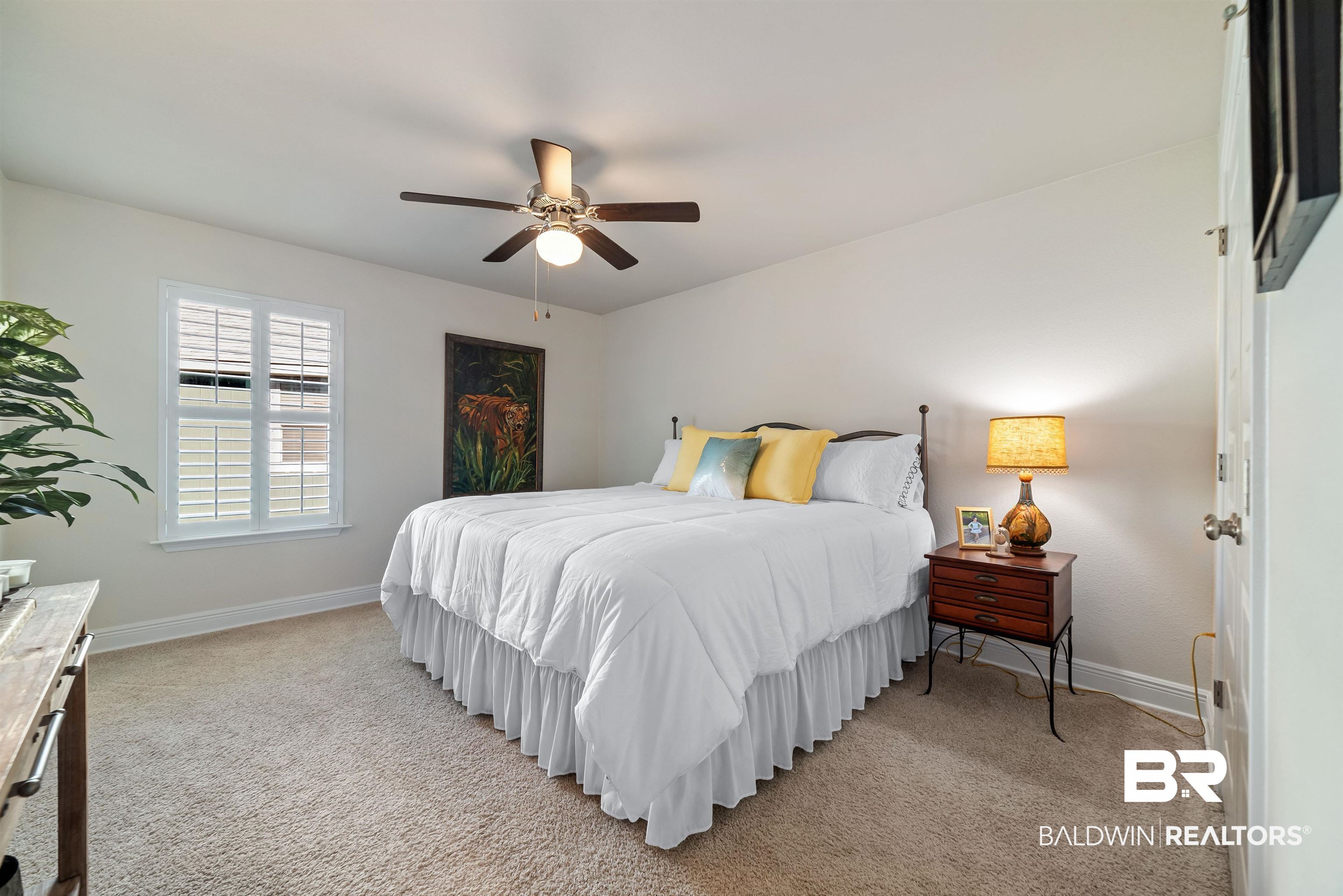 1290 Mako Loop Gulf Shores, AL 36542 - Photo 31 of 50 Bedroom featuring light carpet, ceiling fan, and baseboards