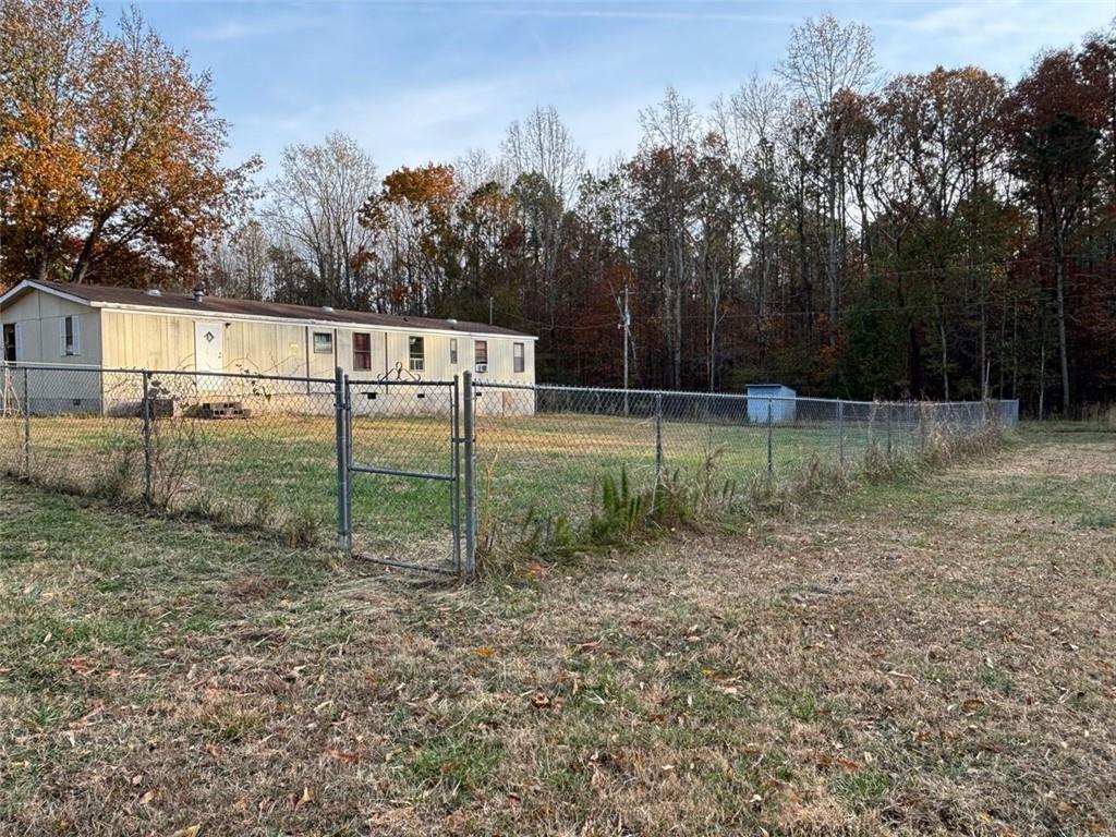 222 Norman Road Athens, GA 30607 - Photo 12 of 13 a backyard of a house with lots of green space
