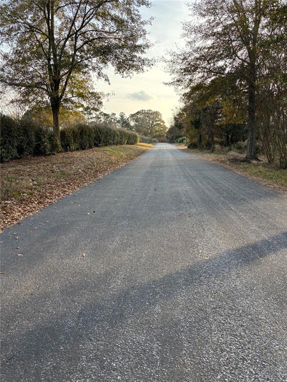 222 Norman Road Athens, GA 30607 - Photo 5 of 13 a view of a field with trees in background