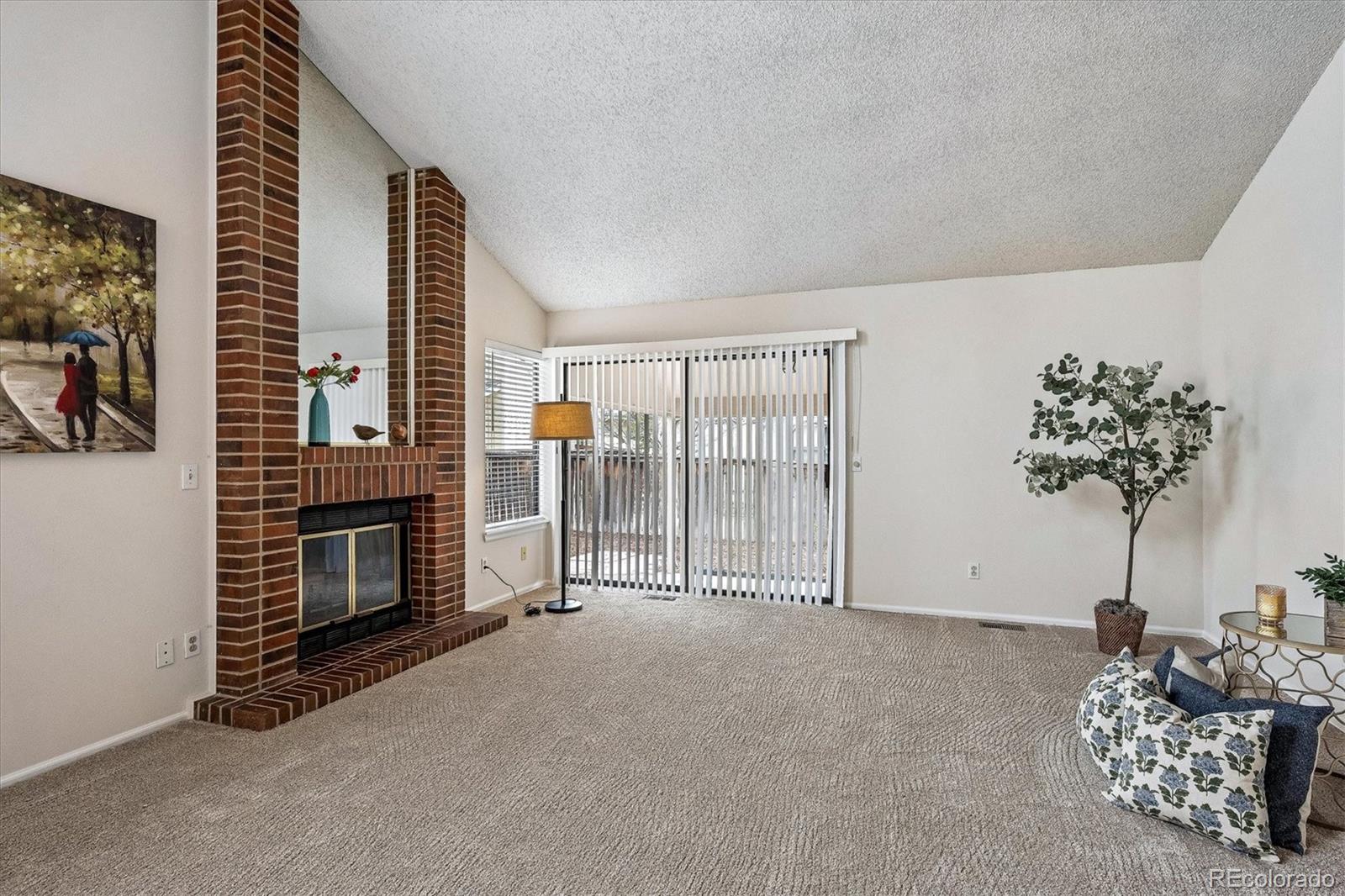 8624 Redstone Street Highlands Ranch, CO 80126 - Photo 5 of 26 a view of livingroom with furniture