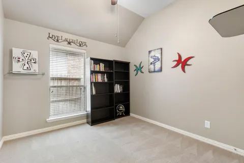 an empty room with shelves