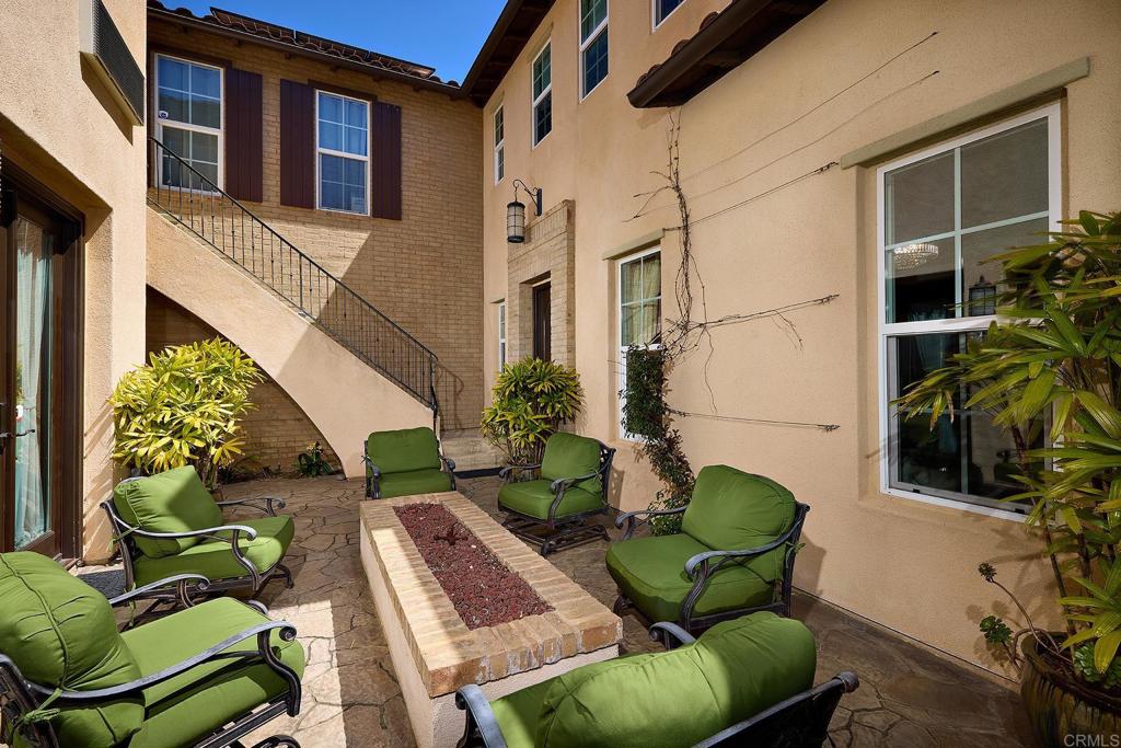 2327 Kyanite Place Carlsbad, CA 92009 - Photo 1 of 1 a view of backyard with outdoor seating and plants