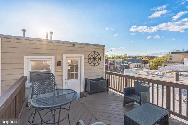a view of a house with a table and chair