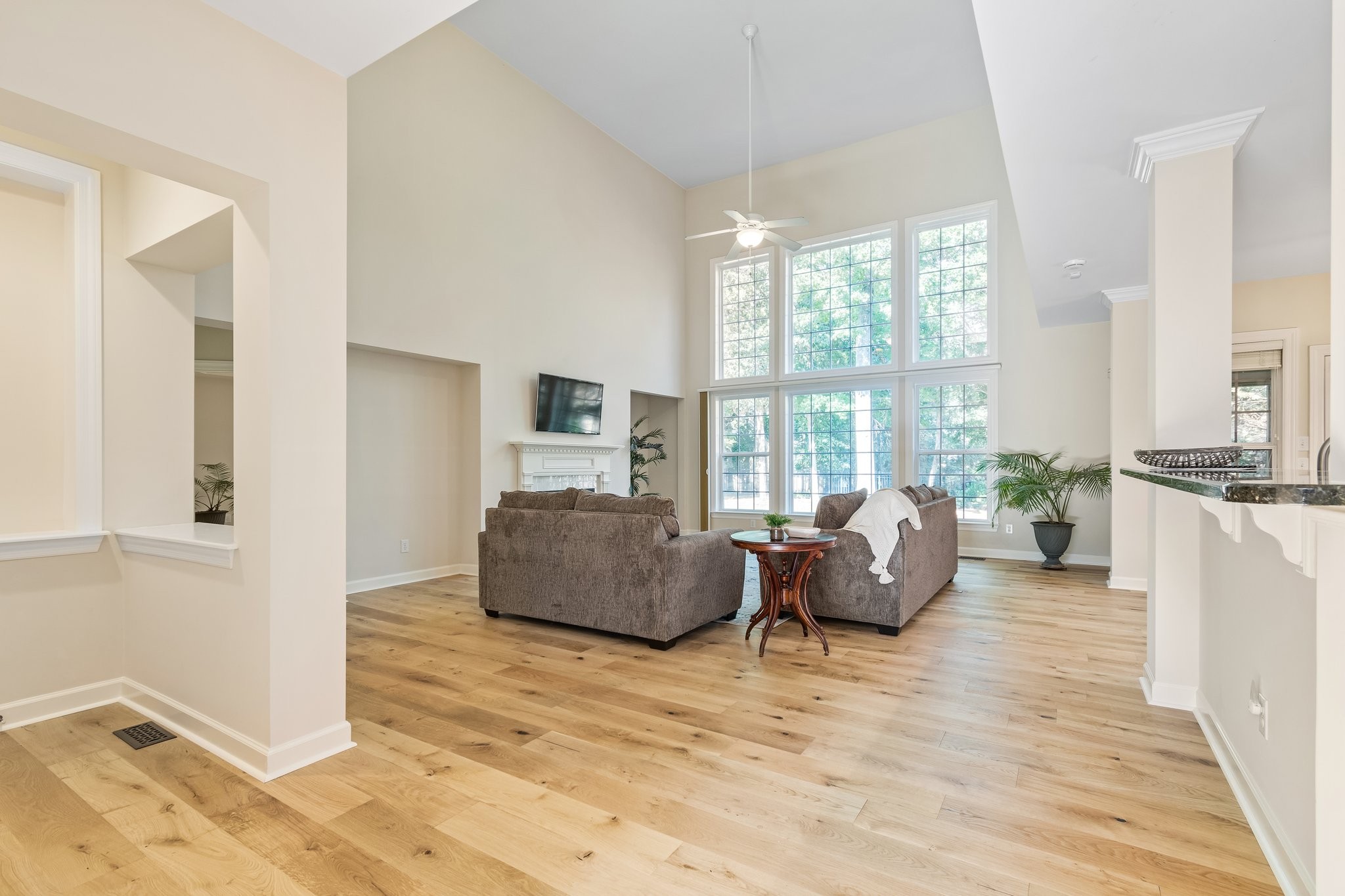 5028 Abington Ridge Lane Franklin, TN 37067 - Photo 14 of 68 a living room with furniture and large windows