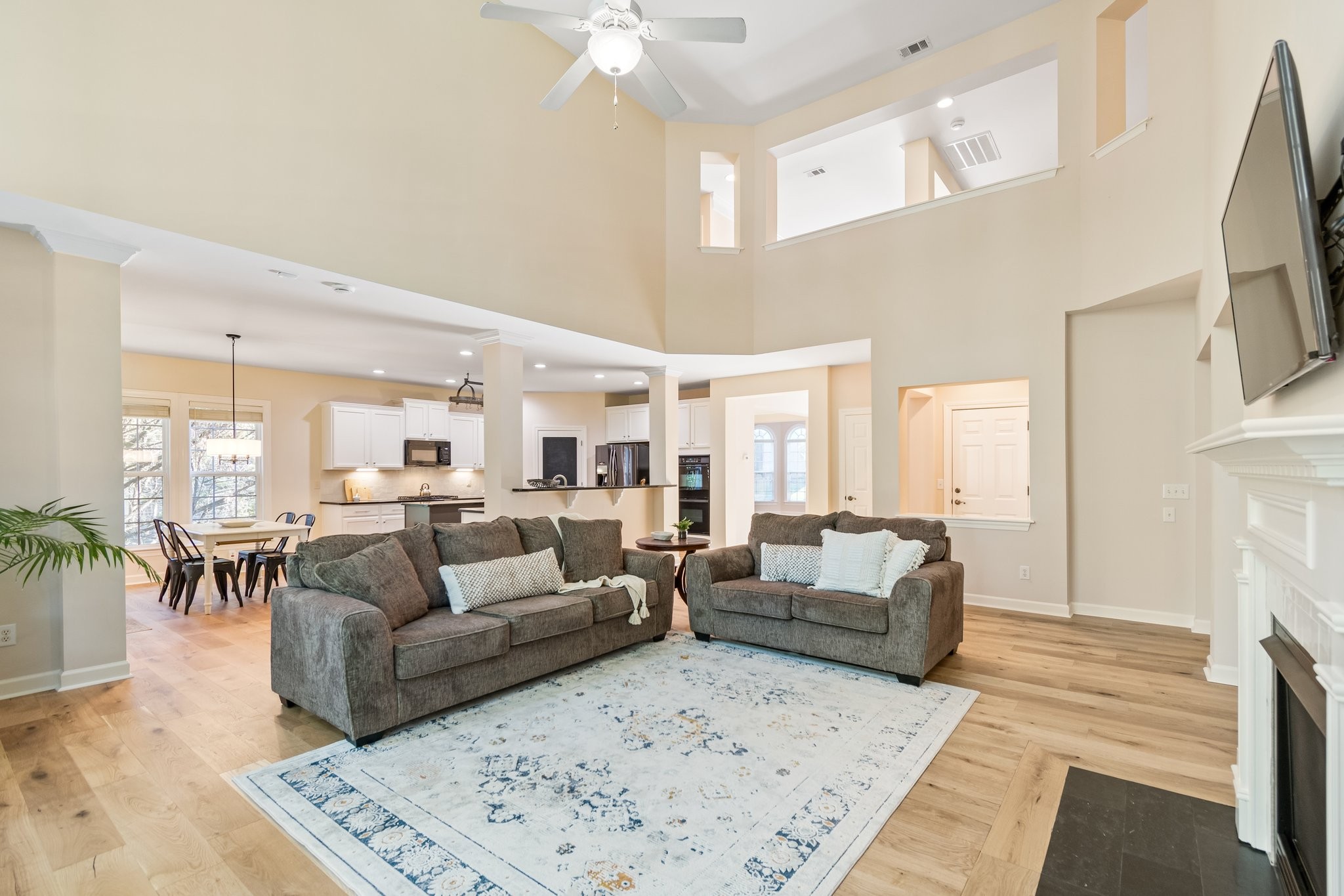 5028 Abington Ridge Lane Franklin, TN 37067 - Photo 20 of 68 a living room with furniture and a fireplace