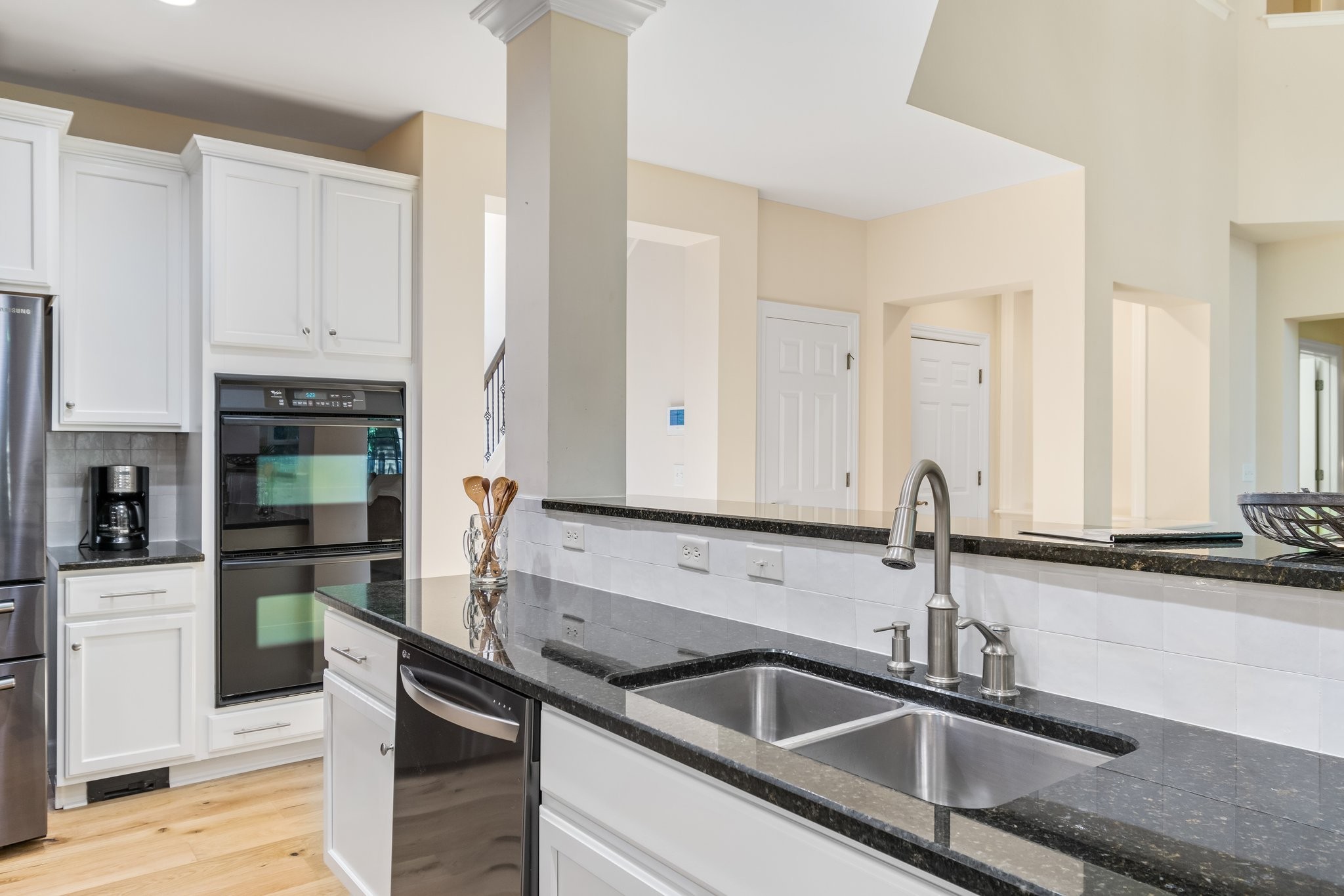 5028 Abington Ridge Lane Franklin, TN 37067 - Photo 28 of 68 a kitchen with stainless steel appliances a sink and cabinets