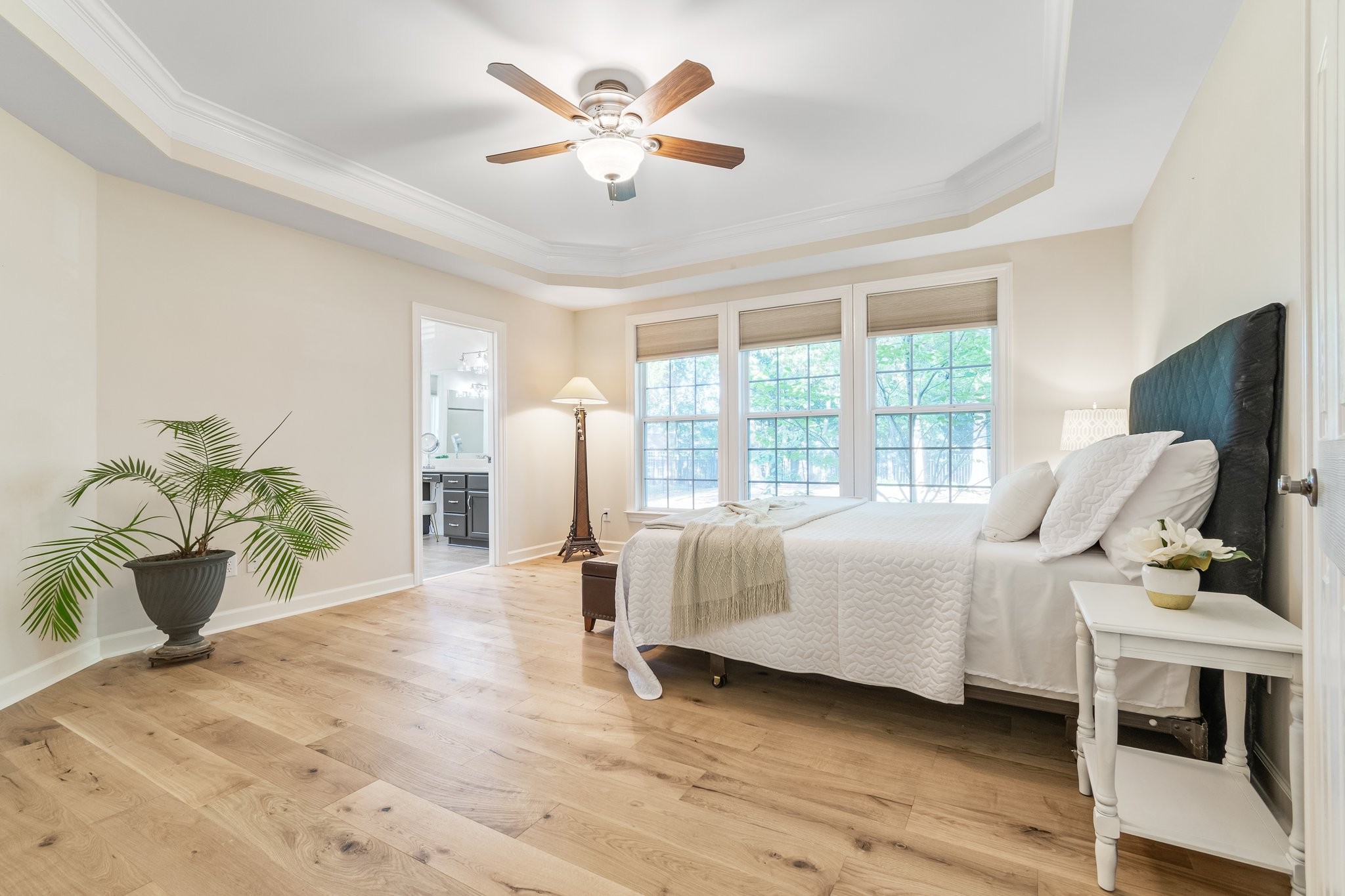 5028 Abington Ridge Lane Franklin, TN 37067 - Photo 37 of 68 a bed room with a bed and a chandelier
