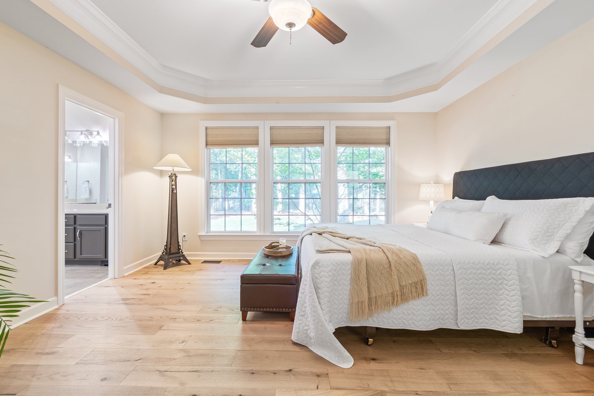 5028 Abington Ridge Lane Franklin, TN 37067 - Photo 38 of 68 a spacious bedroom with a bed and wooden floor