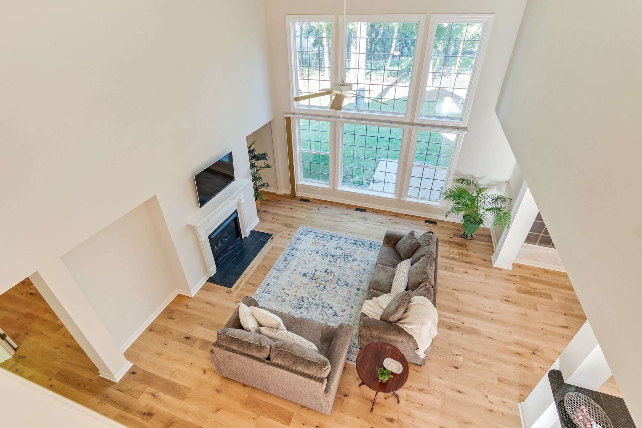 5028 Abington Ridge Lane Franklin, TN 37067 - Photo 43 of 68 a living room with furniture and a fireplace